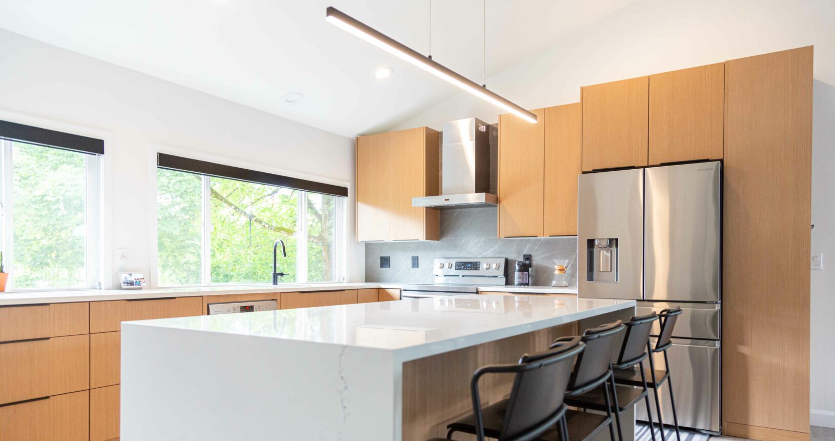 image of kitchen with white countertops